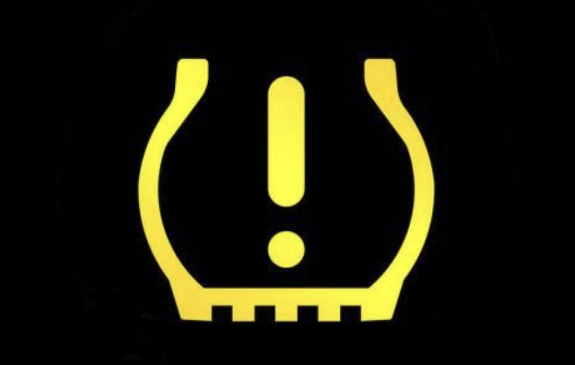 Technician Diagnosing TPMS Sensors
